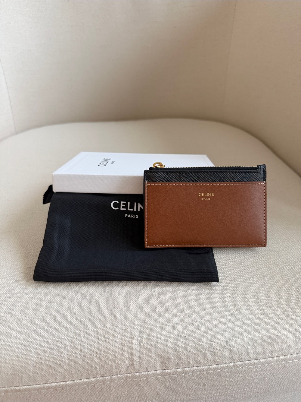 Celine 
ZIPPED CARD HOLDER IN TRIOMPHE CANVAS AND LAMBSKIN